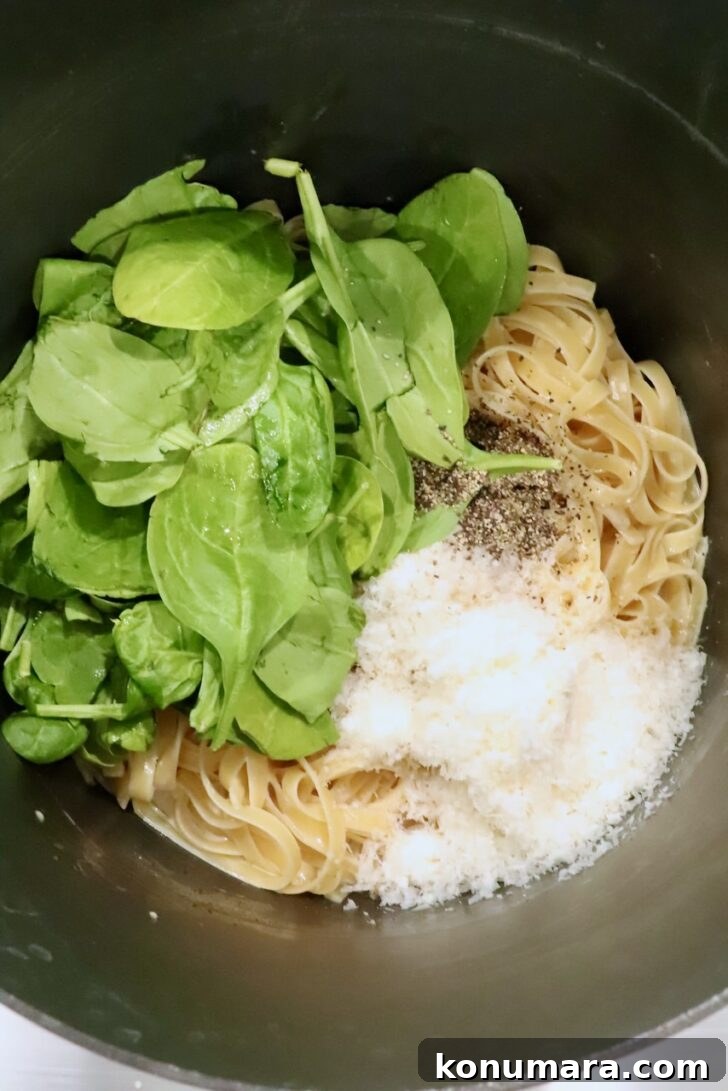 Creamy Chicken Caesar Pasta with Parmesan and Croutons 10 spinach, noodles, parmesan cheese, and black pepper in a large pot
