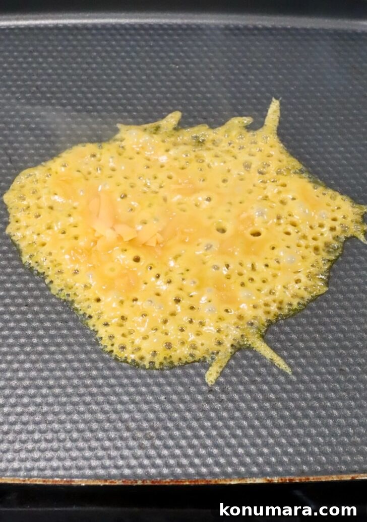 melted cheese on a griddle pan