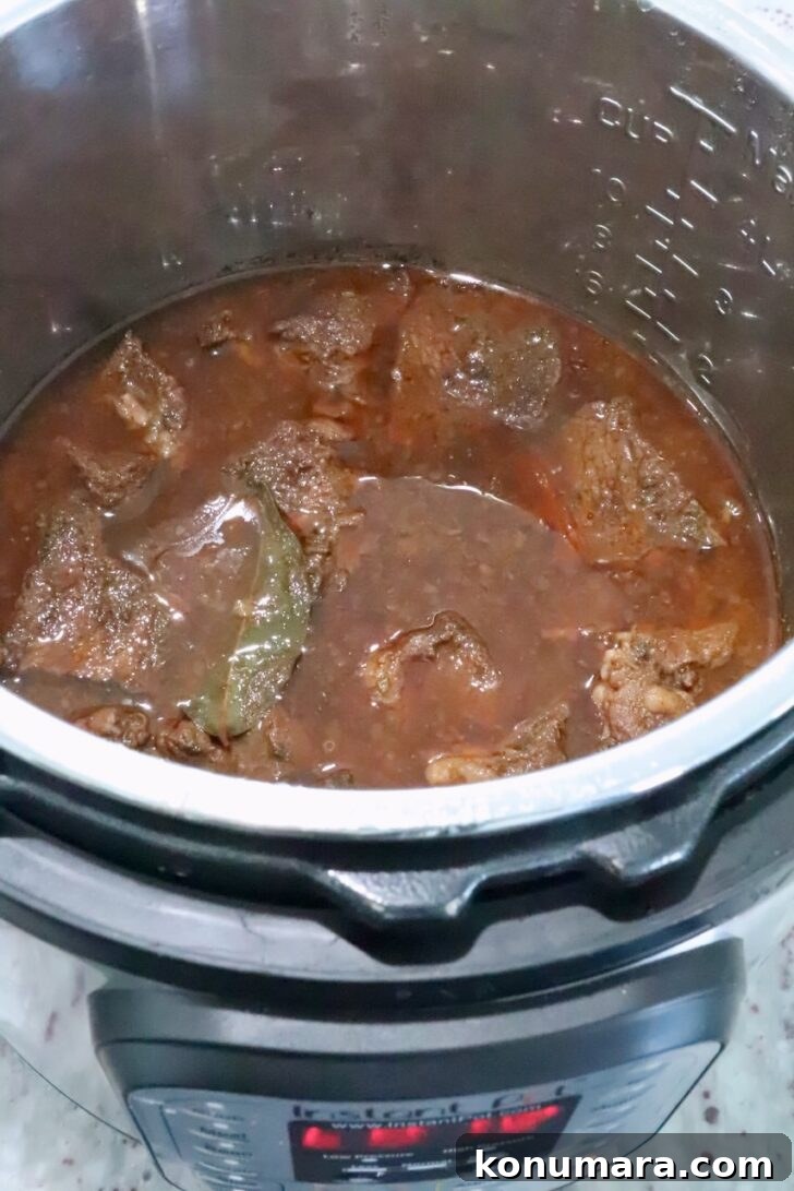 cooked beef in broth in an Instant Pot