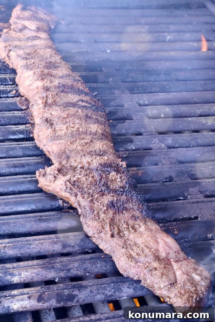 marinated skirt steak on a grill