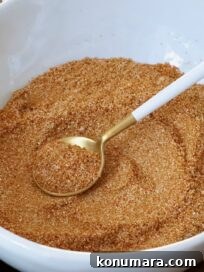 shawarma seasoning mixed up in a bowl with a spoon