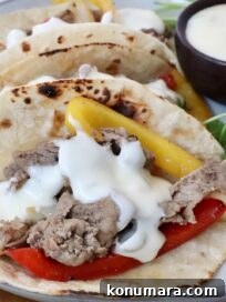 Chicken Shawarma Tacos with Garlic Yogurt Sauce 13 Philly Cheesesteak Tacos