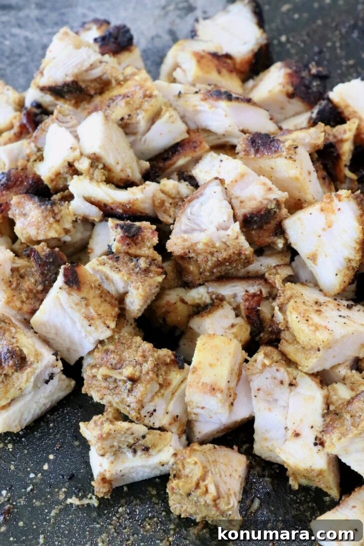 Chicken Shawarma Tacos with Garlic Yogurt Sauce 9 diced shawarma chicken on a cutting board