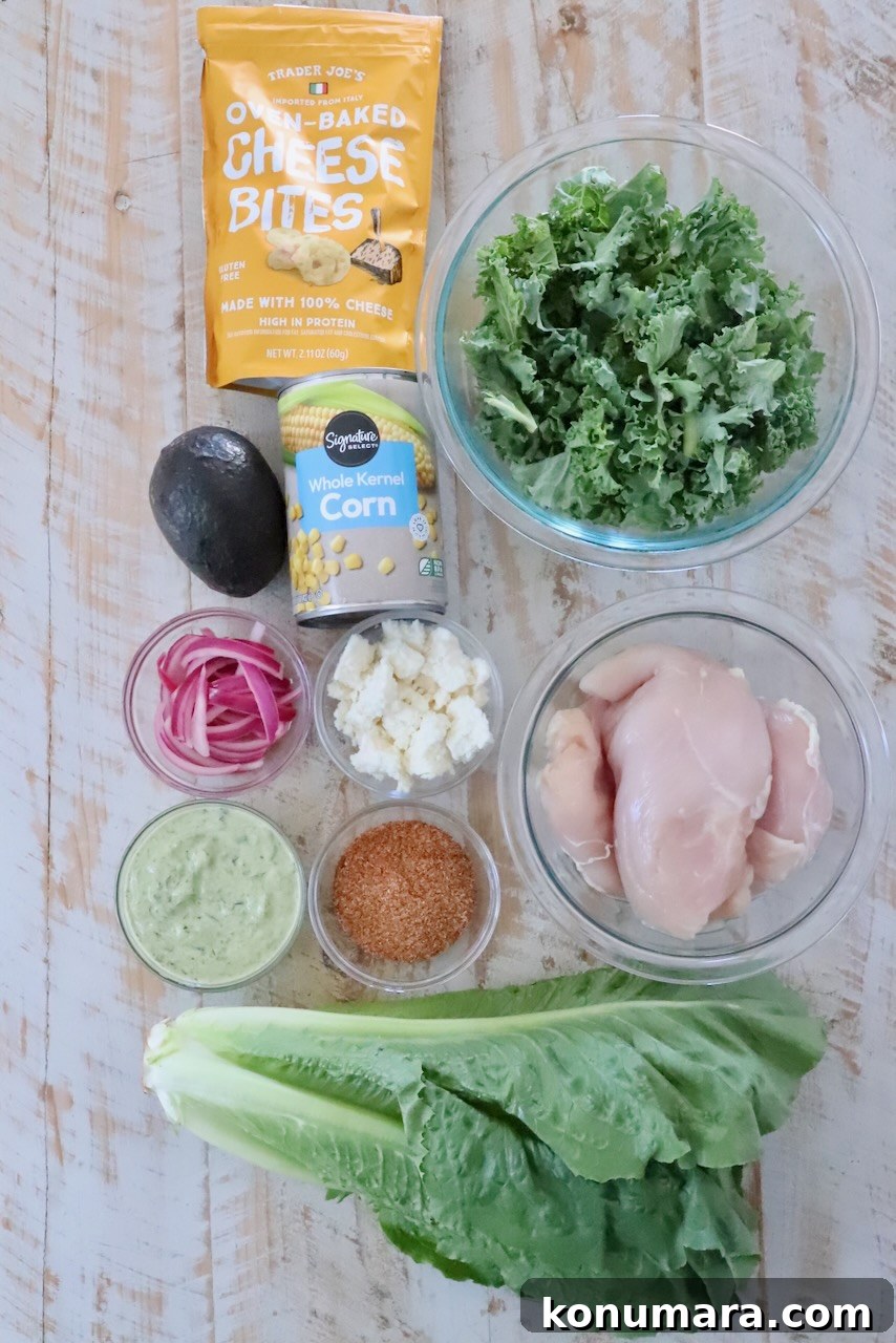 Chicken Taco Salad with Creamy Poblano Ranch 5 ingredients for chicken taco salad on a white wooden table