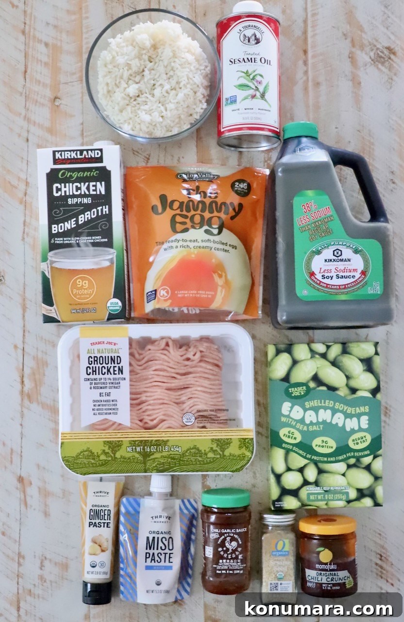 ingredients for miso ginger broth bowls laid out on a white wood surface