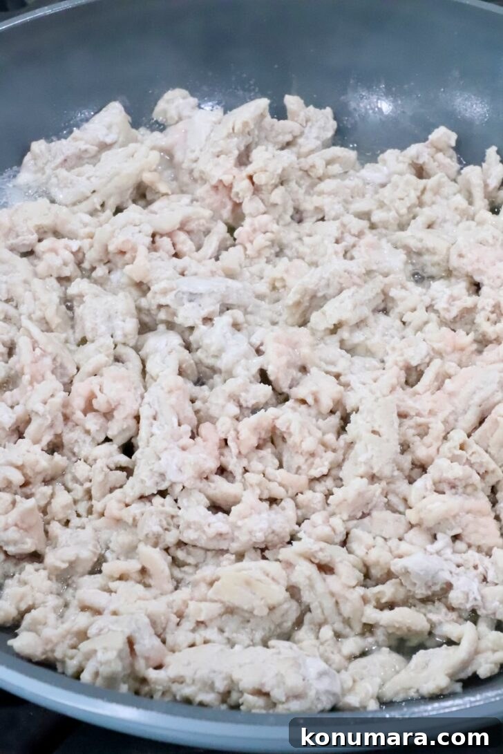 cooked ground chicken in a skillet